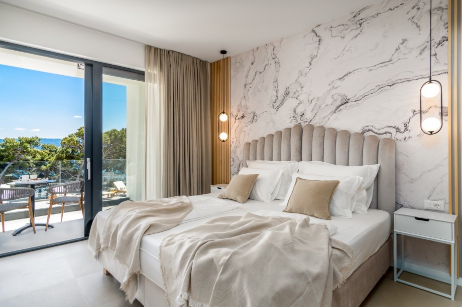 Master bedroom No2 also offers a terrace with sea and pool views