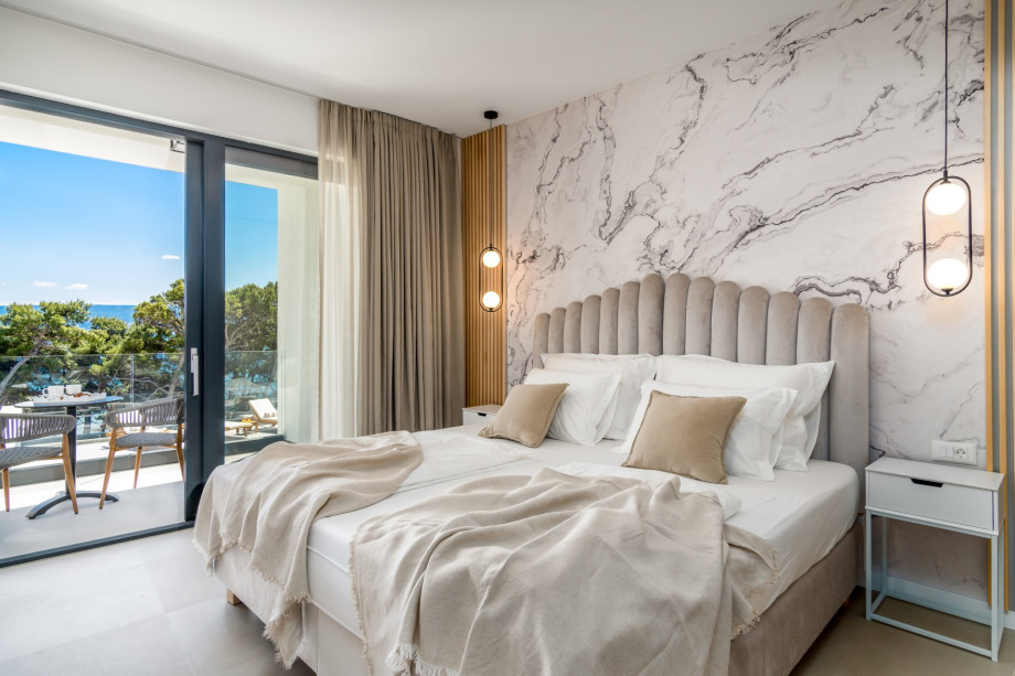 Master bedroom No2 also offers a terrace with sea and pool views