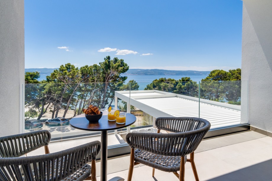 Bedroom No4 offers a balcony with table for two