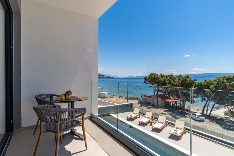 Exit to the terrace with amazing sea and pool view