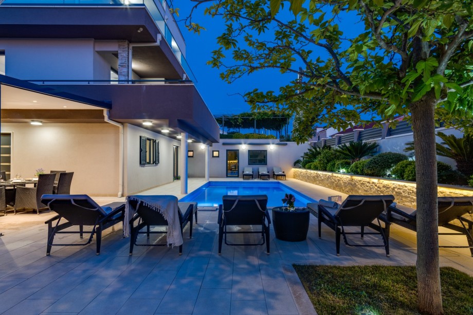 Night view of the villa and outside area