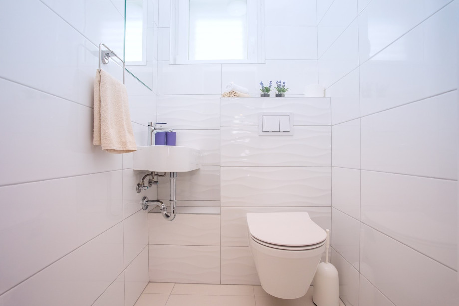 Small toilet with sink