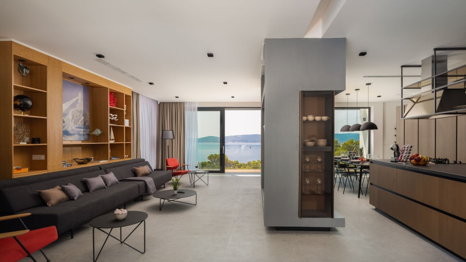 This level offers a living/dining/sleeping area together with a pool area