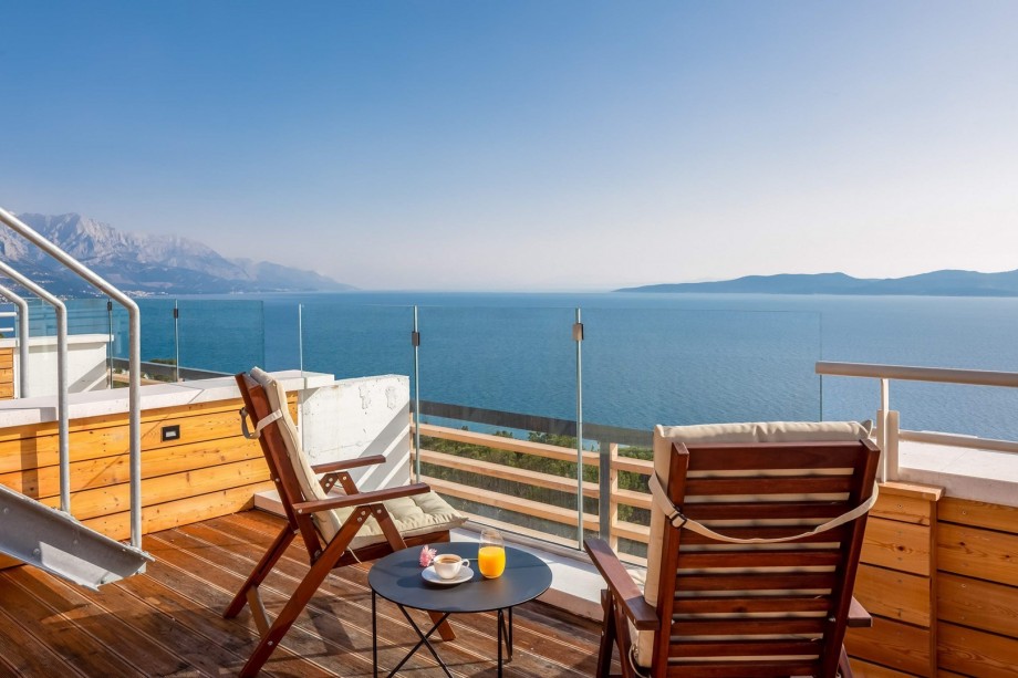 A cozy sitting area with spectacular, elevated views of the Adriatic sea, coast, and islands