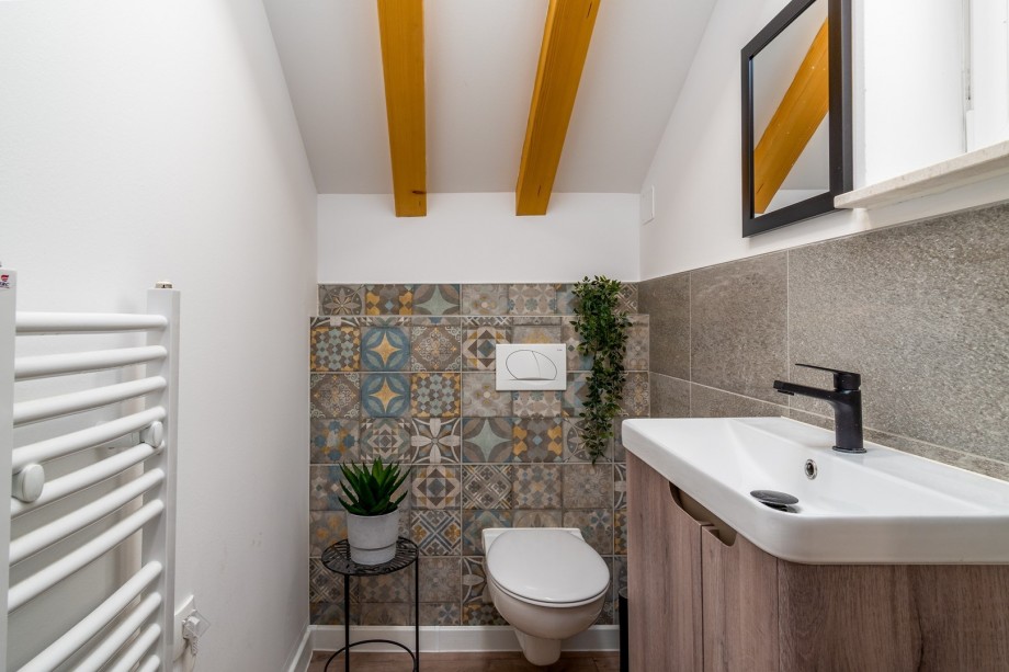 On this level there are also a separate toilet and a washing machine