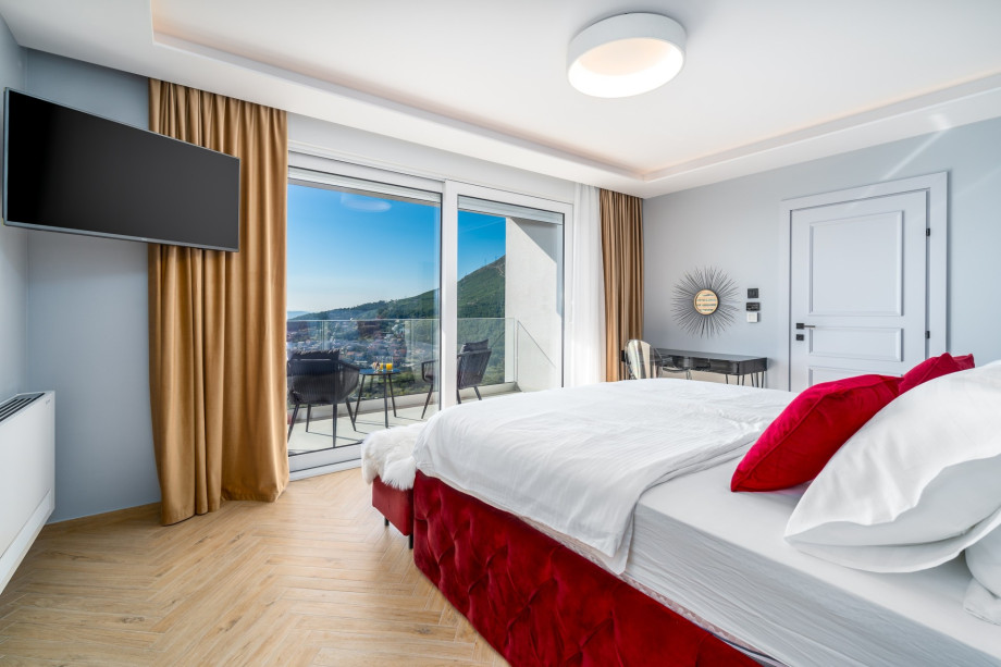 A Bedroom No2 also offers an entrance to the balcony with a sea view