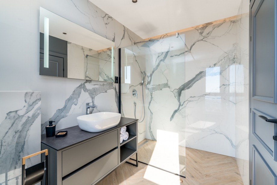 En-suite bathroom with a shower.