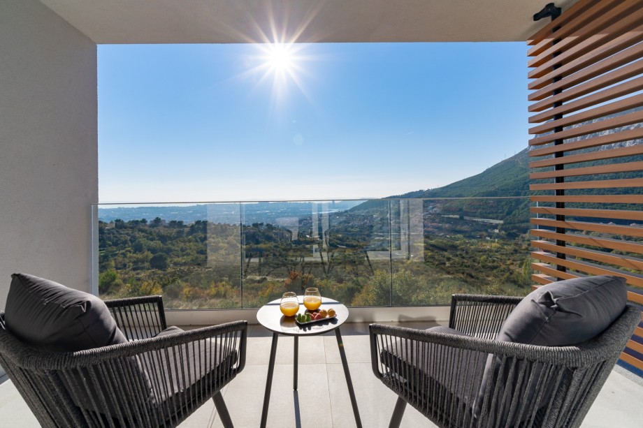 A terrace with outdoor furniture.