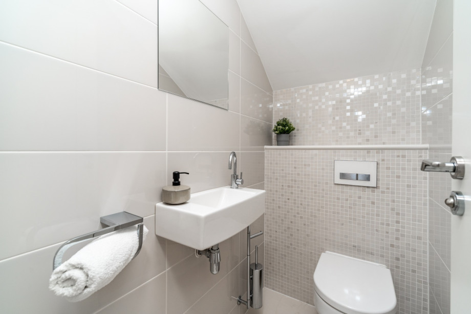 Separate toilet and a washing machine