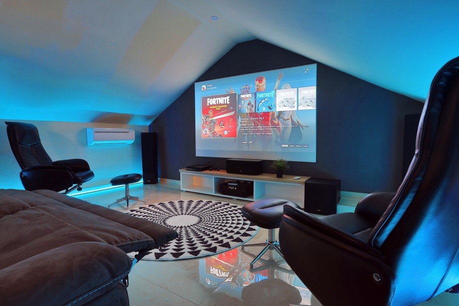 The attic offers a Cinema room with a Projector, PS4, Netflix, HBO, free WiFi, A/C, and relaxing sofas for an amazing home cinema experience.