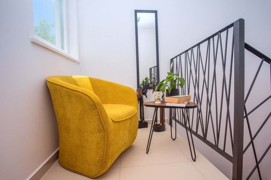 Staircase to the 3 bedrooms upstairs