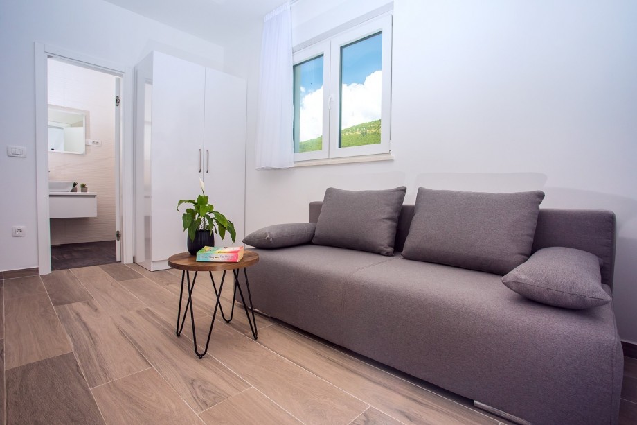 Bedroom No.1 with double bed& sofa bed& en-suite Bathroom & exit to the terrace