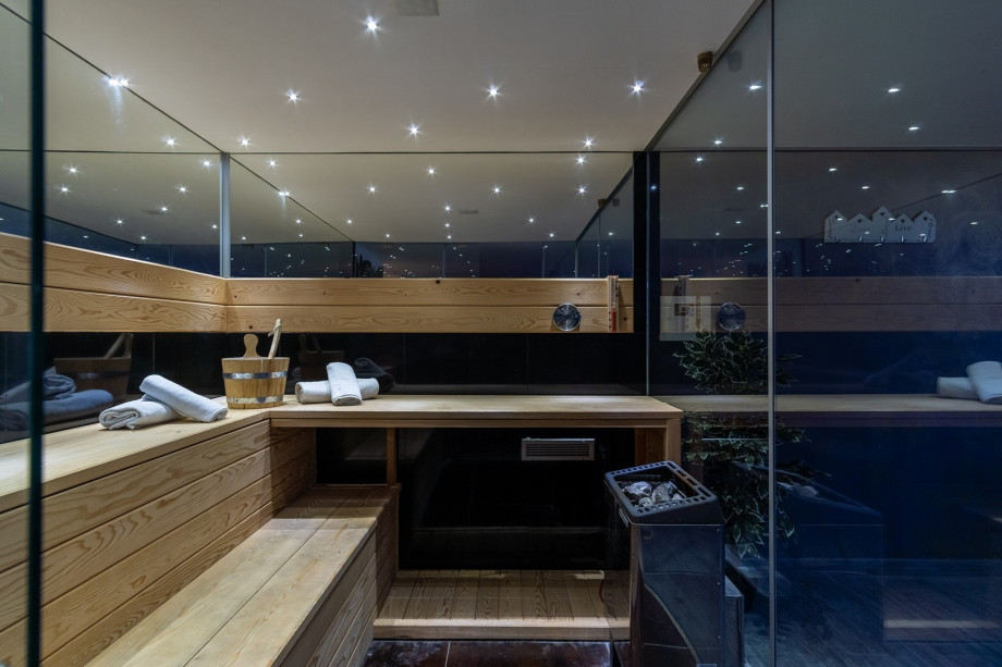 gym area and Finnish sauna, there is also a shower, a toilet & a washing machine