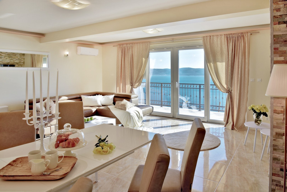 Fully airconditioned a living room offers a flat-screen TV, PS4, free WiFI, satellite channels, and a spacious sofa.