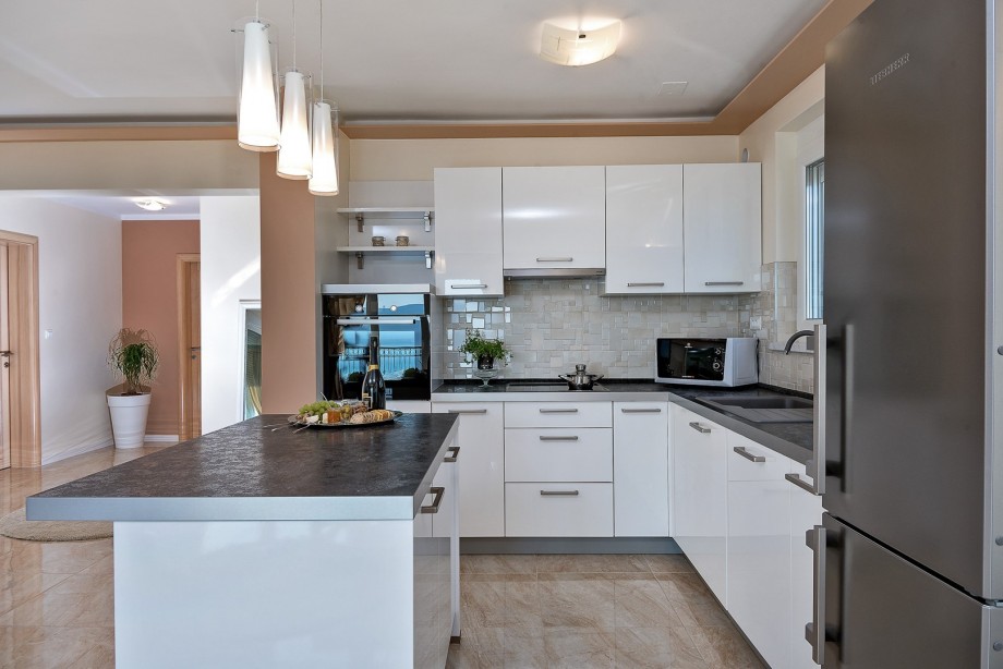 fully equipped kitchen with all the amenities that a modern guest needs for their comfortable stay