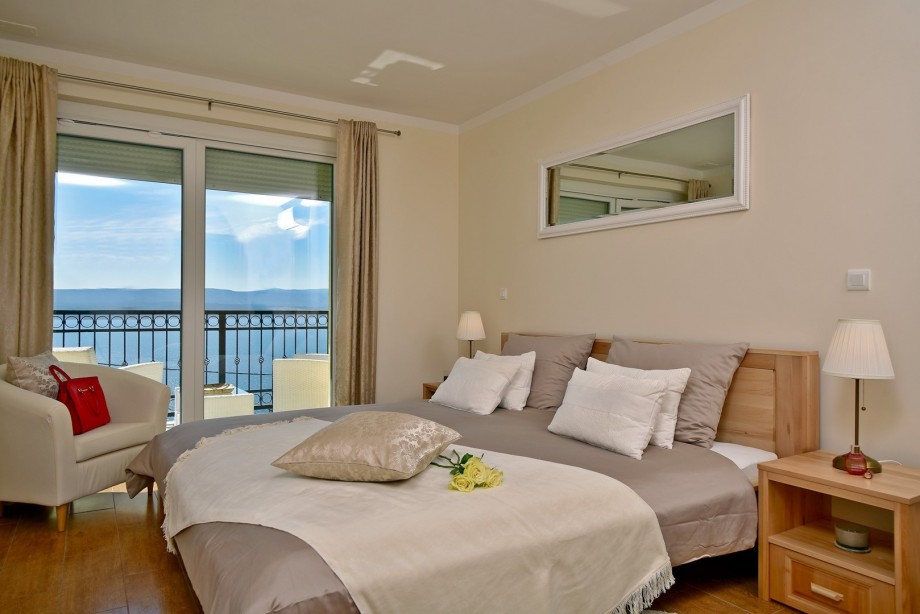 From the spacious and air-conditioned hallway, you are entering into a Bedroom No1 with a super king-size bed 200 x 210 cm, A/C,