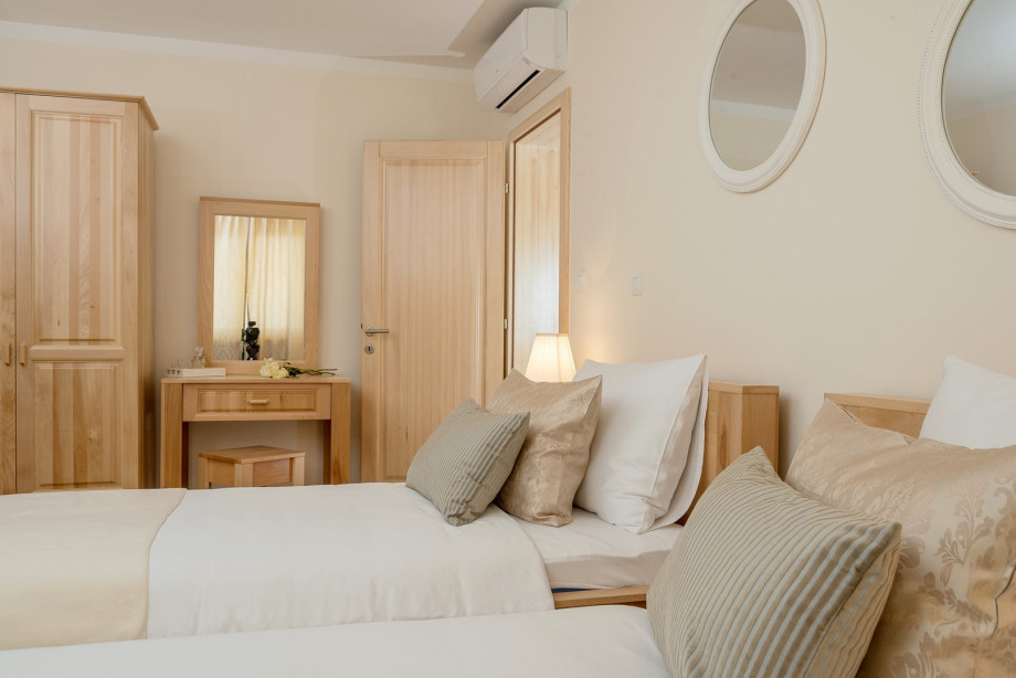 Bedroom No2 with two single beds, 2 x 100cm x 200cm, A/C and sea views.