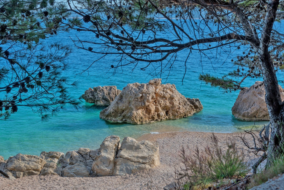 . The beach in Mimice is with pebbles and the sea is  christal clear
