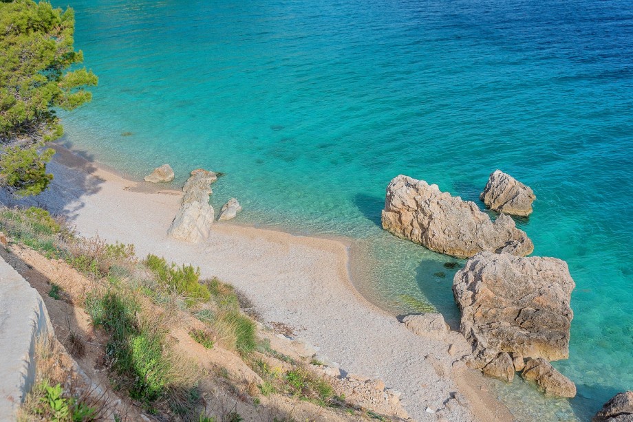 . The beach in Mimice is with pebbles and the sea is  christal clear