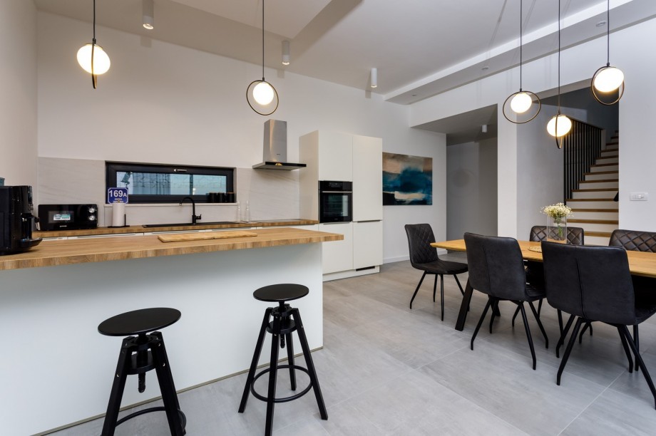 A fully equipped kitchen with all  modern guest needs (dishwasher, microwave oven, toaster, kettle, an espresso coffee machine...and more)