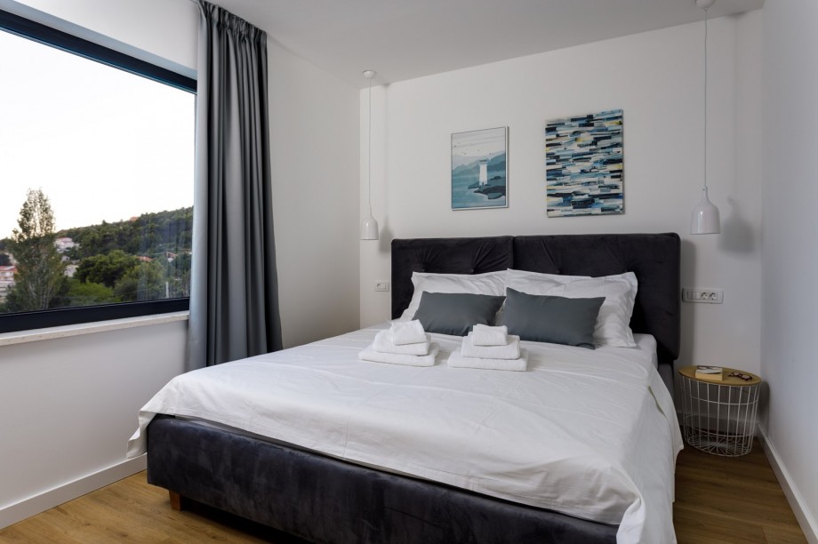 Bedroom No 3 with king size bed 180cm x 200cm, en-suite bathroom with a shower.