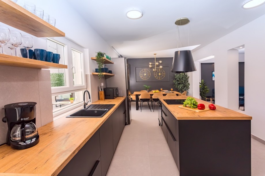 The ground floor offers a very spacious and comfortable opened plan living and dining room