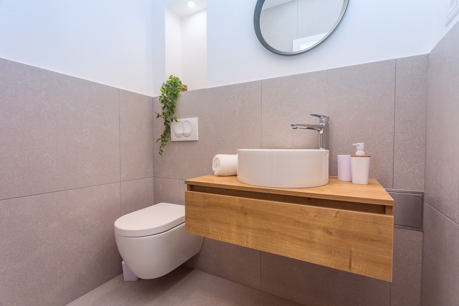 A separate toilet on the ground floor, next to the Media room