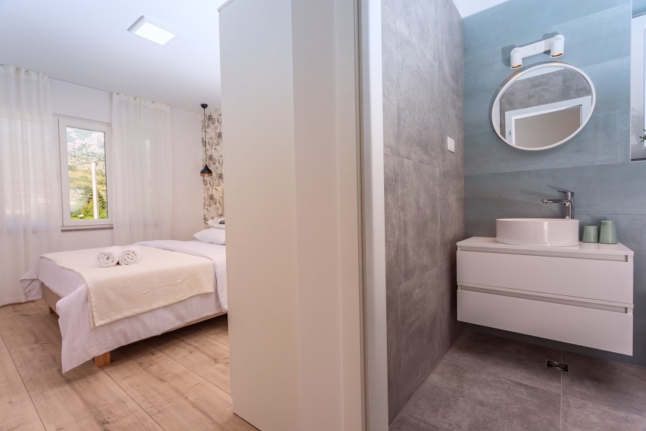 Bedroom No3 has exit to the balcony with mountain views.