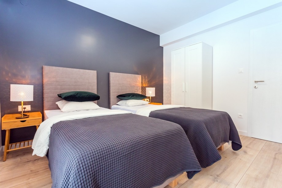 Bedroom No4 has exit to the balcony with mountain views.