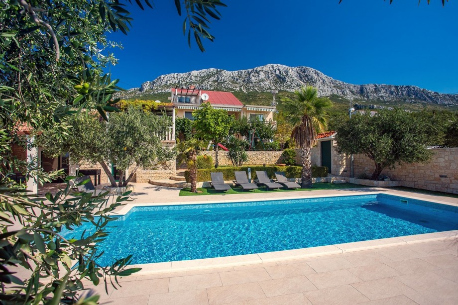 Pool view on the surrounded nature and mountains