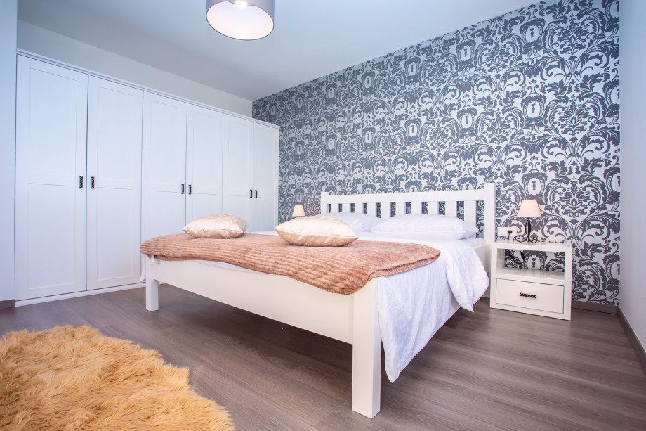 Bedroom No2 with king size bed, sofa bed for 1 person, exit to terrace with sea and pool view, A/C, TV, en-suite Bathroom No2 with shower