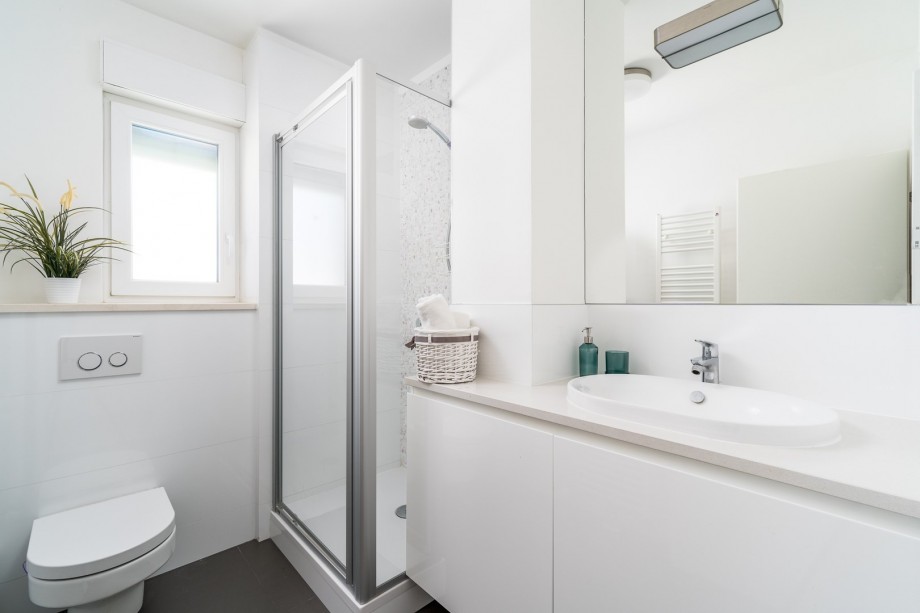 En-suite bathroom with a shower.