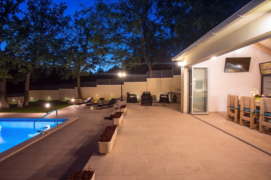 Relaxing area next to the great lighted pool area