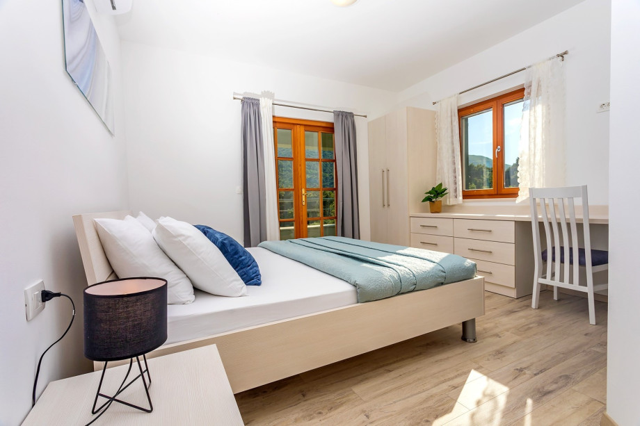 Bedroom No1 with double bed, ensuite bathroom with shower and balcony