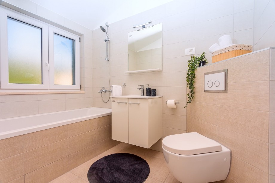 Bathroom with bathtub and toilet