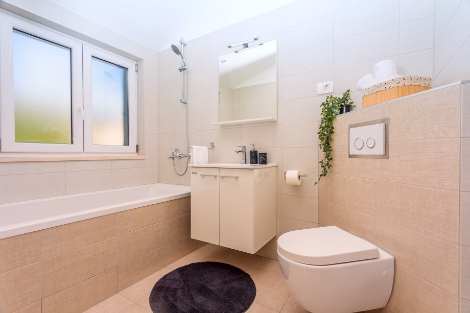 Bathroom with bathtub and toilet