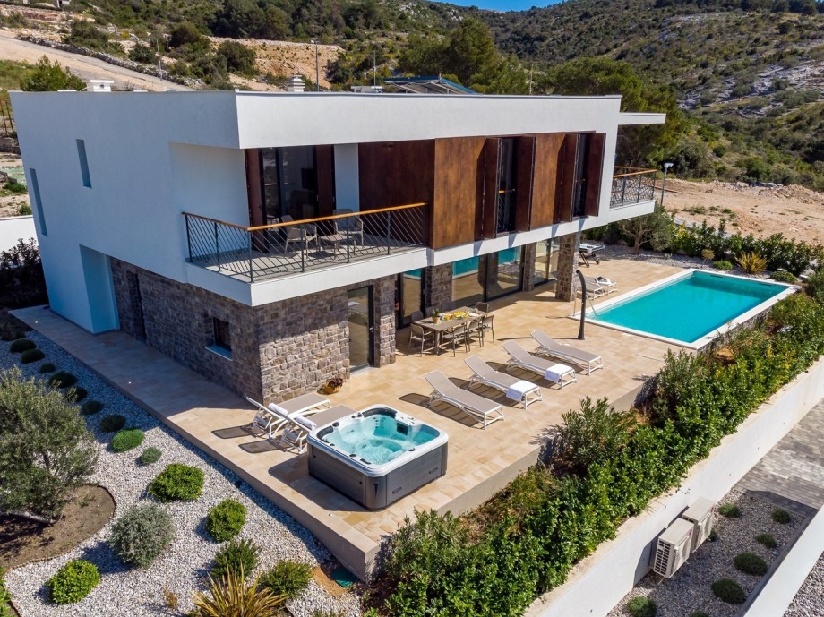 Stylish 4-bedroom villa with a private 35 sqm heated pool, Whirlpool and Sauna, only 150m from the beach