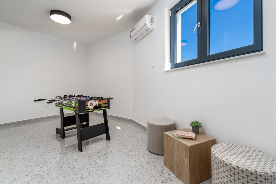 There is also one playroom with air conditioning and table soccer.