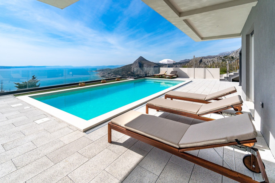 A stunning 36 sqm (9x4m) heated swimming pool with massage.