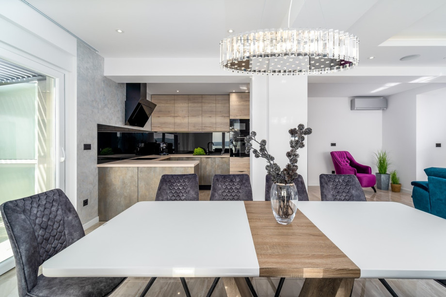 A spacious dining area with open and panoramic views of the Adriatic sea, islands and direct approach to the pool area.