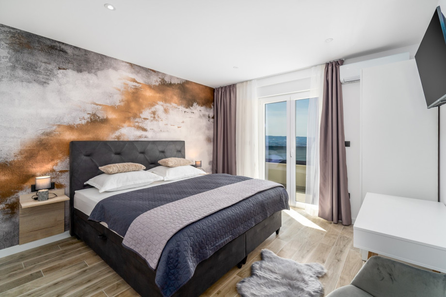Bedroom No4 with  amazing sea views and a huge open terrace with comfortable outdoor furniture