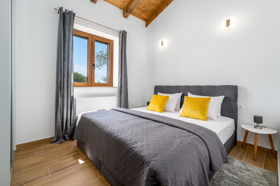 Bedroom NO4 with king-size bed 180x200cm, A/C, TV, views on the sun deck and playground with swing.