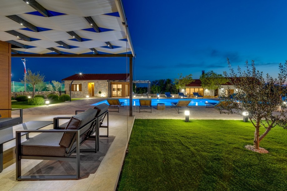 There is playground for your youngest with slide and swings.