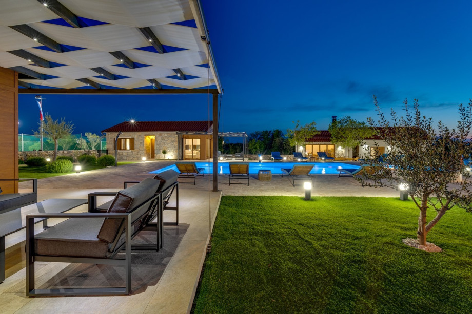 There is playground for your youngest with slide and swings.