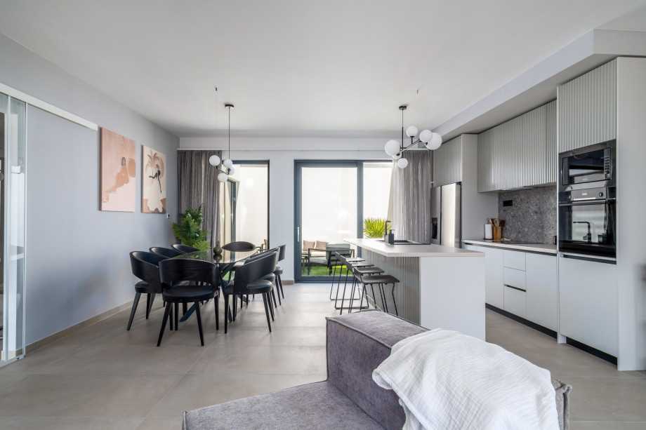 The Interior is very well organized, modern and light, giving a deeper dimension with half floors and glass fences