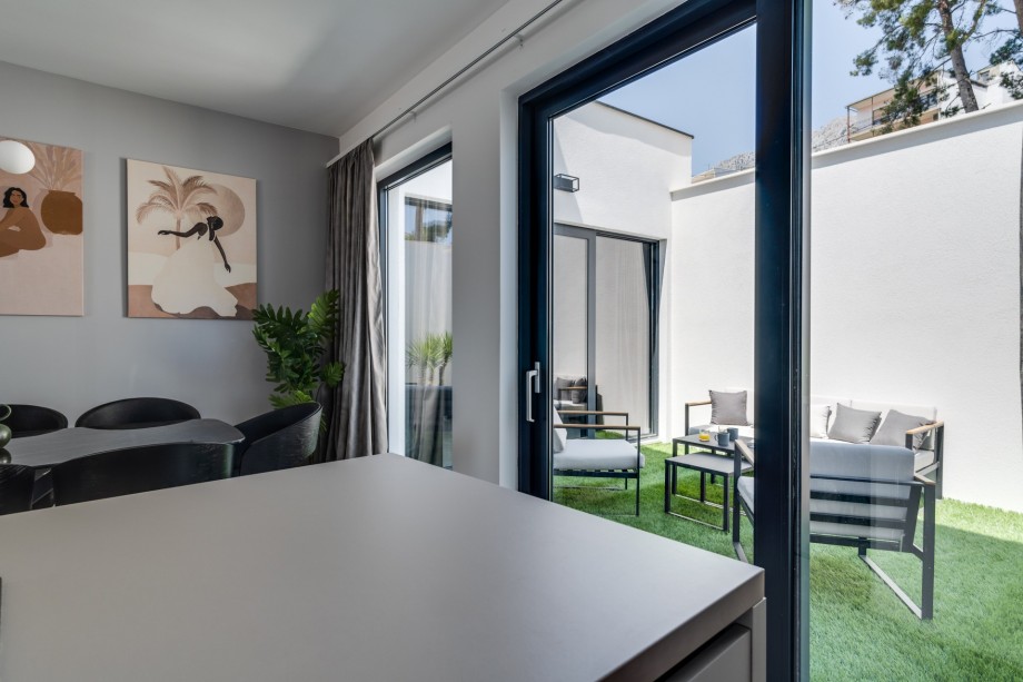 You can approach the terrace with a garden furniture