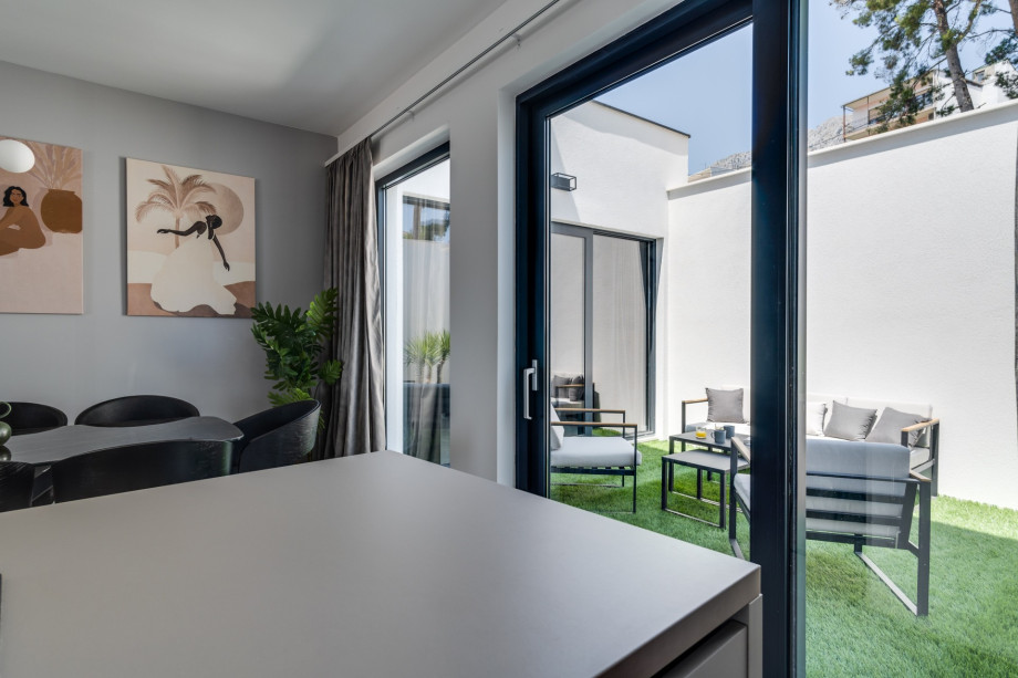 You can approach the terrace with a garden furniture