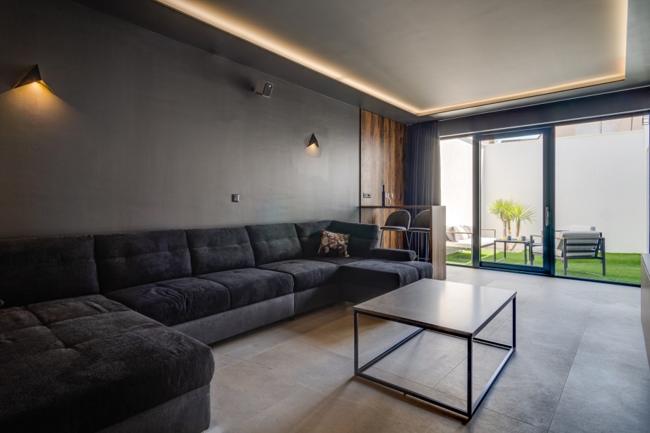 From this level, a few steps down takes you to a bedroom No1 full of light and sun, and a separate Toilet