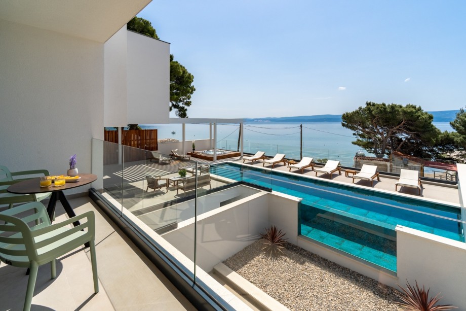 Bedroom No2 offers an exit to a terrace with a table for two