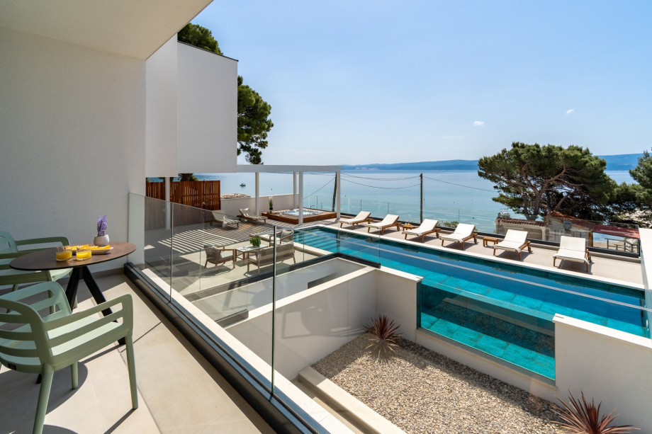 Bedroom No2 offers an exit to a terrace with a table for two